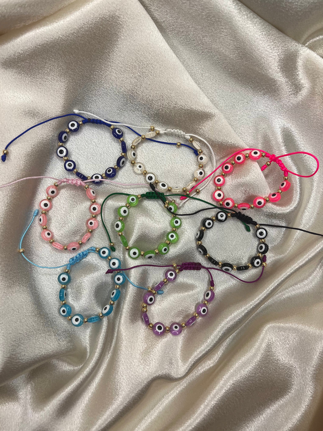 Basic evil eye thread bracelet